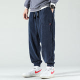 Sutton men's loose cuffed streetwear pants in Blue, front view