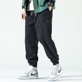 Sutton men's loose cuffed streetwear pants in Black, view 3