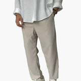 Ambrose men's relaxed pleated texture pants in Beige, front view