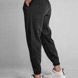 Gilles - Joggers with Button Pockets