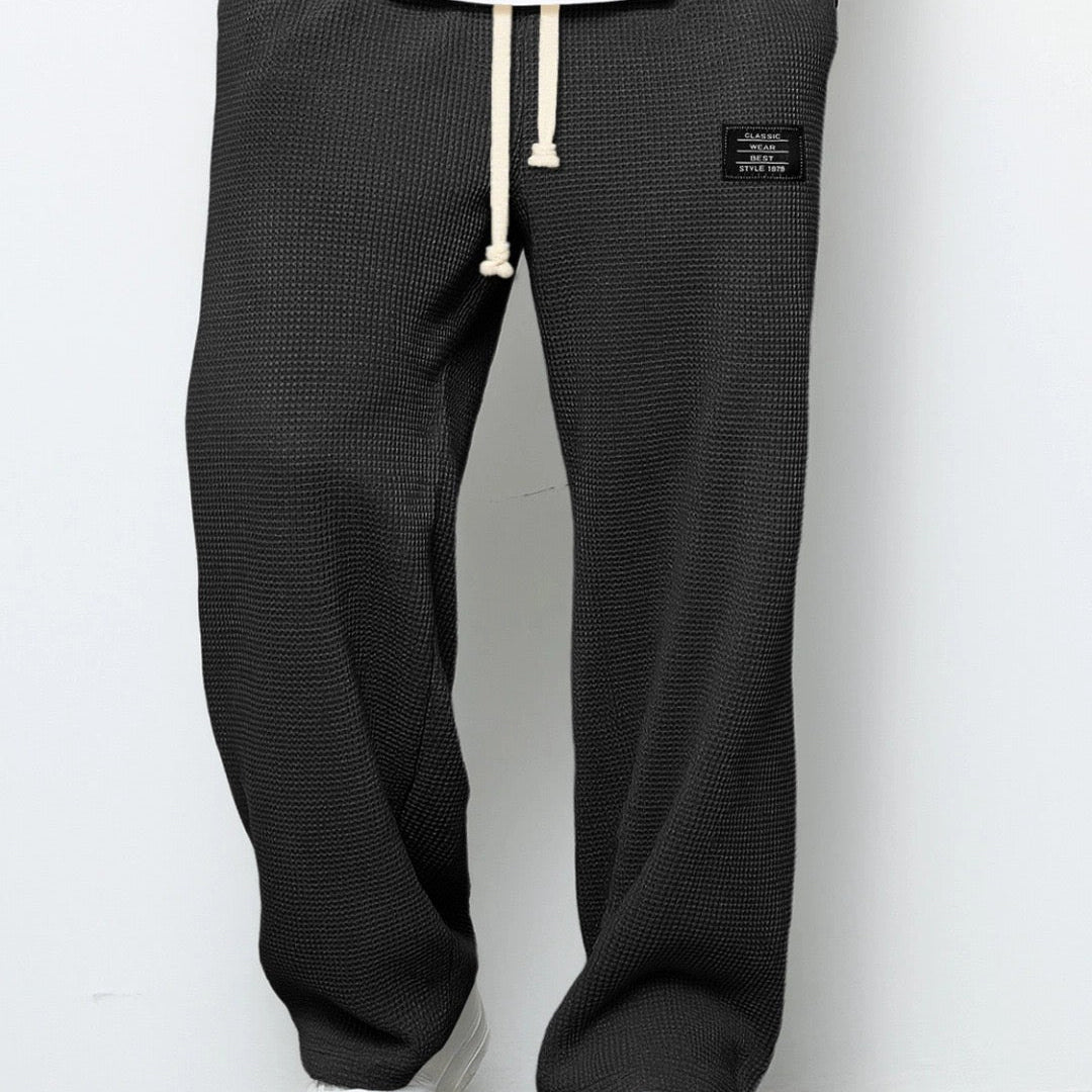 Hugh men's black waffle drawstring pants, front view