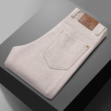 Normand men's plaid wool blend pants in Beige, front view