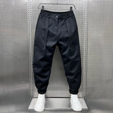 Judd men's textured pleated tapered pants in Black, view 8