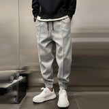 Zacharie men's brushed cuffed joggers in Grey, front view